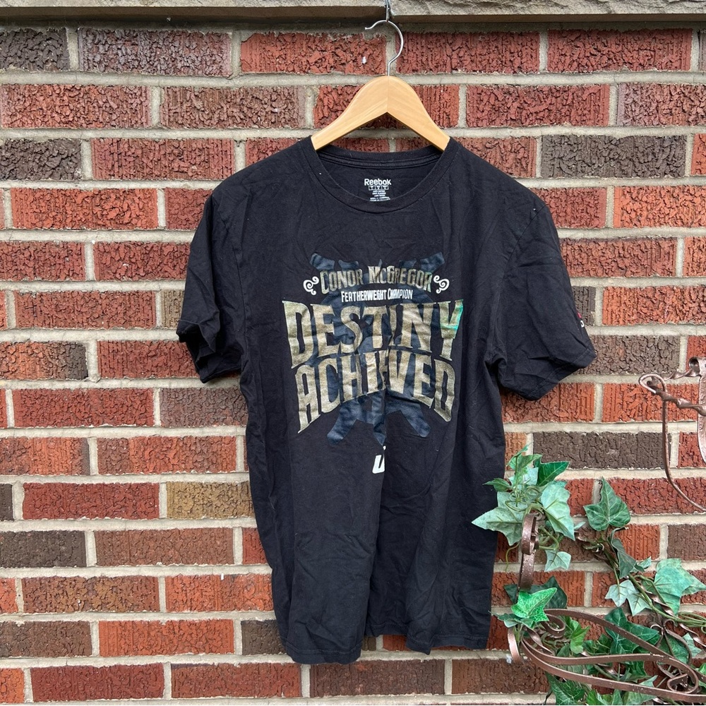 Reebok Black and Gold Conor McGregor Destiny Achieved Short Sleeve Tee Shirt